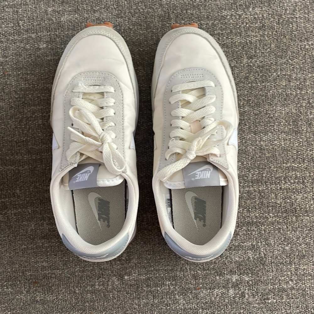 Nike cream tennis shoes
